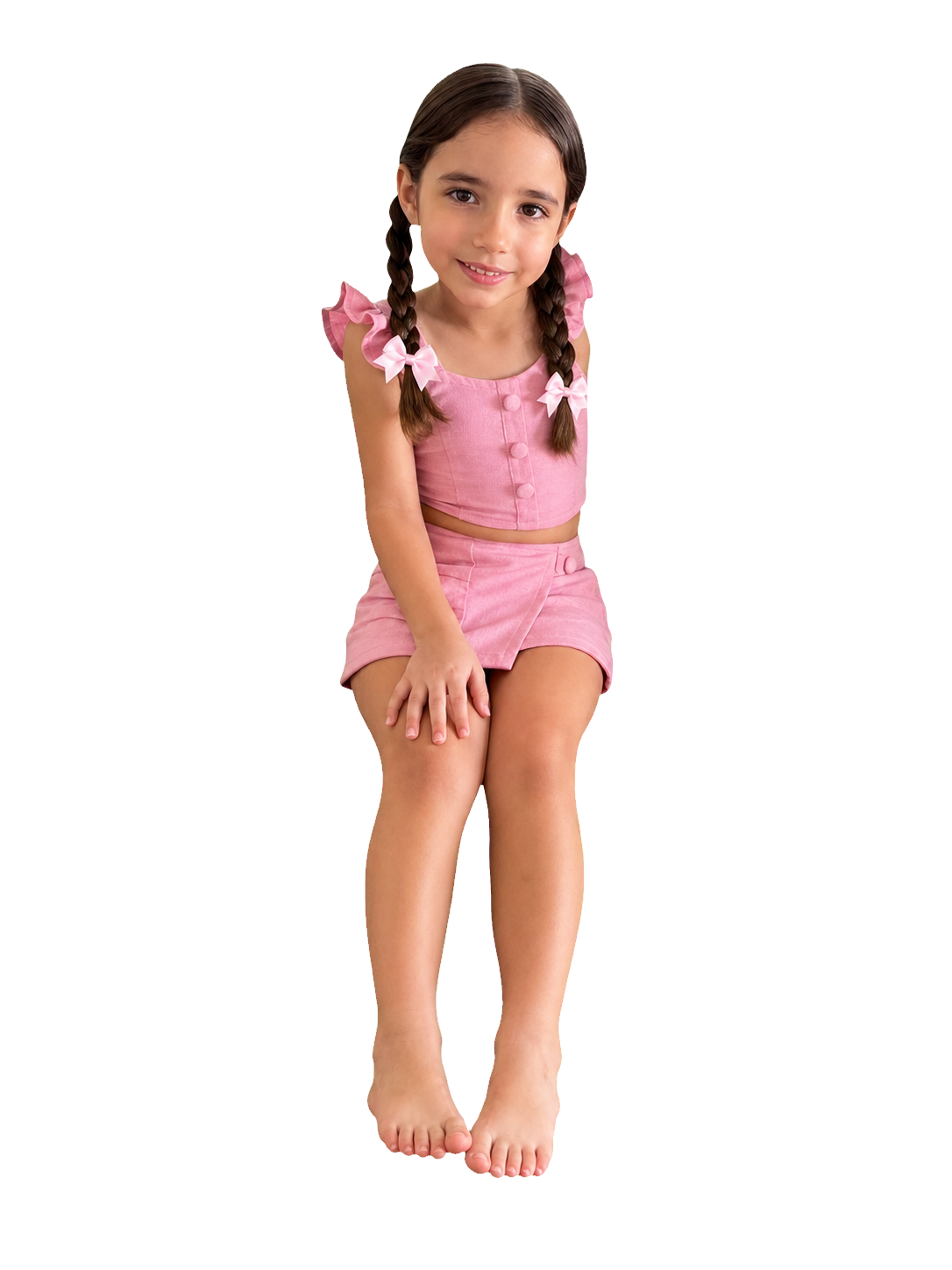 Neta com roupa rosa e trancinhas